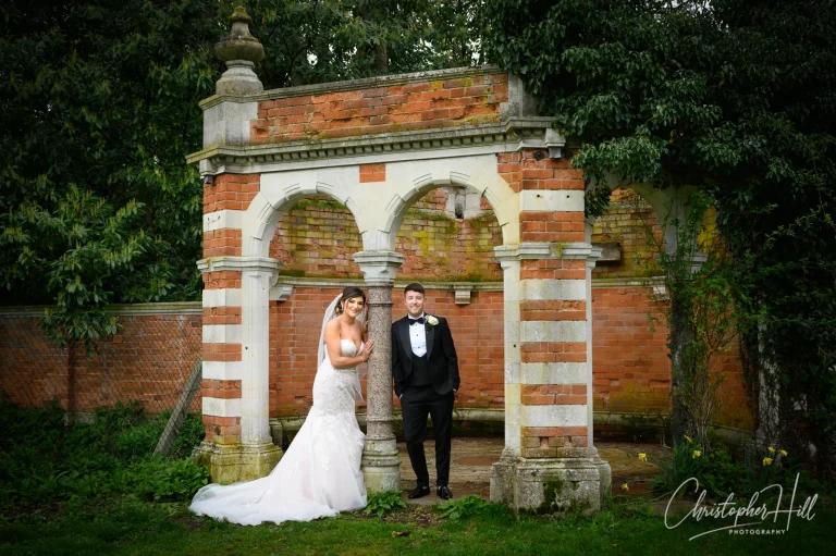 bride and groom at tudor barn wedding